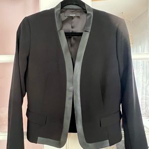 Black Tahari blazer.